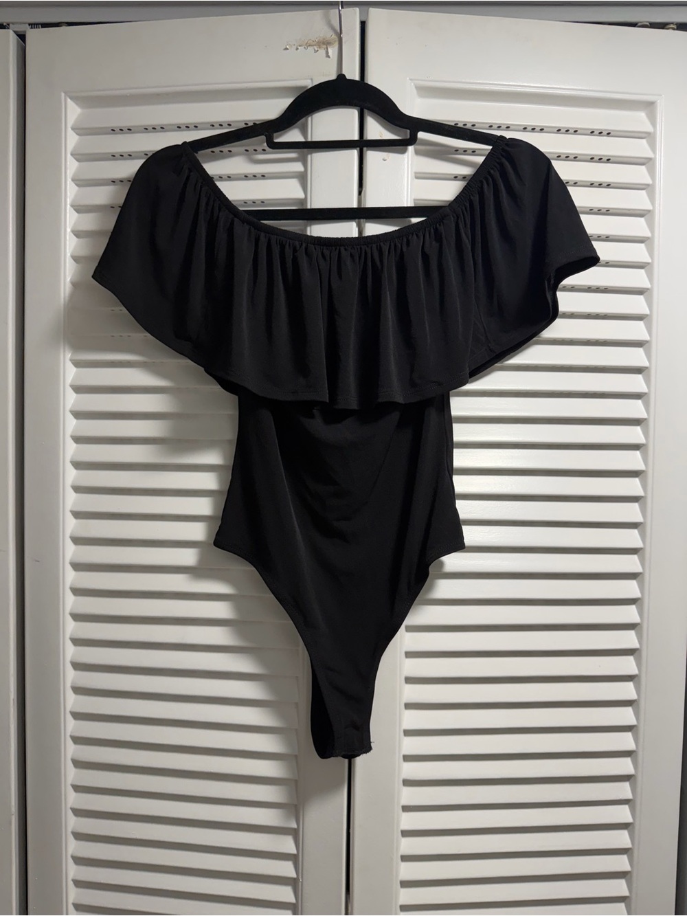 Veronica M Black Off-Shoulder Ruffle Bodysuit